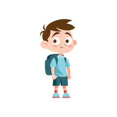Smiling schoolboy walking with backpack on blue