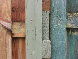 A detailed view of a wooden fence, showcasing its texture and design.
