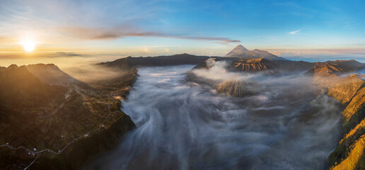Panoramic view of Mount Bromo and Cemoro Lawang village, Bromo Tengger Semeru national park, Java, Indonesia 2023.  Nature landscape background. Southeast Asia