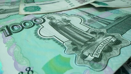 One thousand russian rubble in macro shot. Crimea bridge with ship and seagull as symbol. Gas payment in russian currency. War russia against ukrain concept.