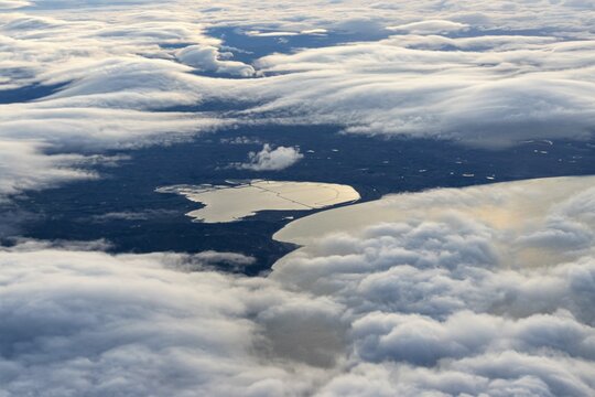An aerial view of the Marlborough Coastline. Visible through the clouds is Lake Grassmere, the lake is used for the production of salt.