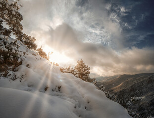 Bavarian Mountain hike to the Herzogstand peak with snow and sun 