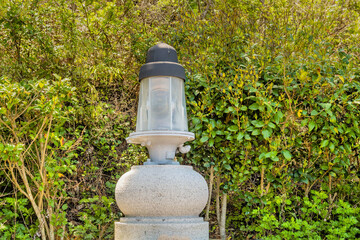 Old rotating beacon light once used in lighthouse.