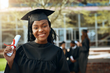 Im super proud of myself. Portrait of a happy young woman holding a diploma on graduation day.