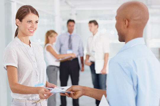 Business, Staff And Black Man With Woman, Documents And Information With A Pamphlet, Open Day And Flyer. Female Employee, Male Consultant And Coworkers With Paperwork, Internship And Partnership