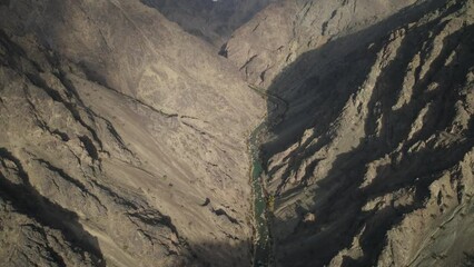 Scenic Aerial View of Gorge River Surrounded by Arid Rocky Mountains at Minaret of Jam Region, Afghanistan