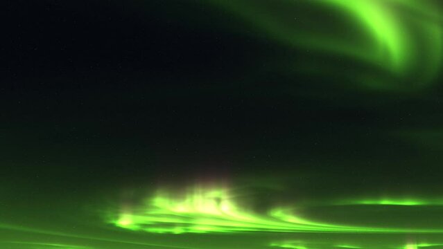 Green Northern Lights in the night sky. Seamless loop