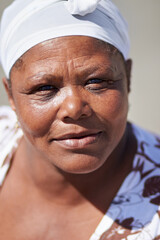Black woman, senior and skin portrait outdoor feeling relax and calm in the sun. Summer, real and...