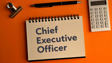 There is notebook with the word Chief Executive Officer.It is as an eye-catching image.