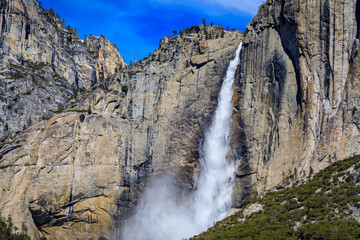 Fototapeta na wymiar Yosemite Falls with snow in the spring, Yosemite National Park, California