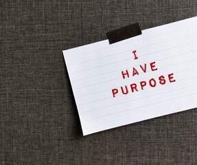 Note stick on wallpaper with affirmation message I HAVE PURPOSE, concept of phrases statements...