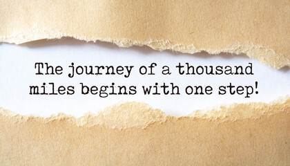 Inspirational motivational quote. The journey of a thousand miles begins with one step. - obrazy, fototapety, plakaty
