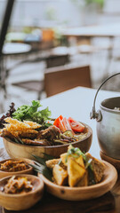 Nasi Liwet Sunda. A traditional Sundanese rice dish of white rice cooked with spices and topped with anchovies, chili peppers and broad beans