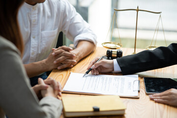 Lawyers sit for a meeting with the team at the law firm.