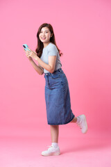 image of asian girl posing on pink background