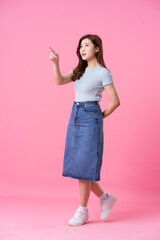 image of asian girl posing on pink background