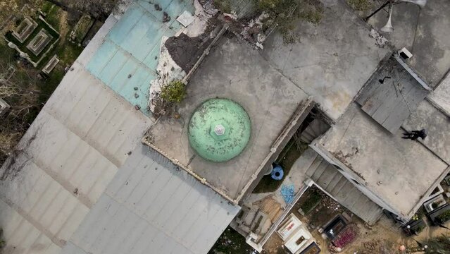 Aerial View Top-Down Exploration of a Shrine Tomb and its Surrounding Graves