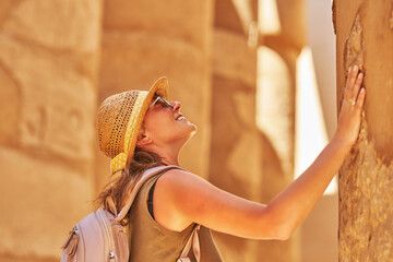 Tourist woman in Karnak Temple in Luxor Egypt