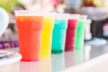 Sicilian Seltz Drinks at Kiosk - A vibrant array of colorful seltz-based beverages in flavors like...