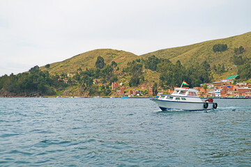 Boat Running on Lake Titicaca, the Highest Navigable Lake in the World, Copacabana Town, Bolivia,...