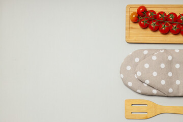 Flat lay with kitchen accessories on light gray background
