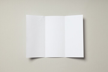 Blank white sheet on light gray background