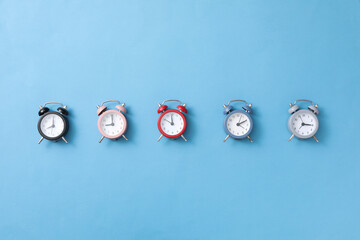 Concept of sleep and wake up with alarm clocks