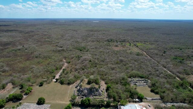 drone shot of mayan ruins abandoned at yucatan jungle in mexico