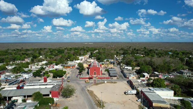 backwards drone shot of ancient church at tahmek yucatan mexico