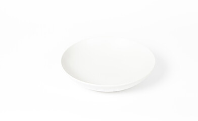 White plate on white background. Space for text, for advertising, banner, signboard, menu and printed materials