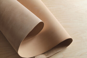 collection of high-quality beige leather swatches in various shades, showcasing their natural elegance and versatility. color trends in interior design or fashion. Neutral Palette