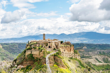Fototapeta na wymiar The ancient hilltop village of Civita di Bagnoregio, Italy, on a sunny day