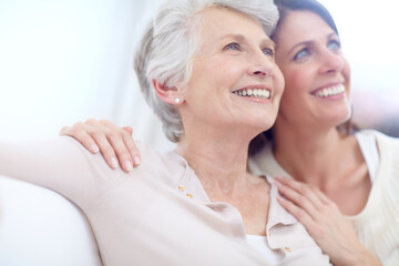 Golden moments together. an affectionate mother and daughter spending time together at home.