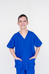 Portrait of a young and skilled medical student, nurse, intern posing with both hands inside...