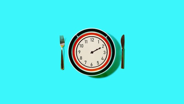 Clock with hands on plate with fork and knife on turquoise