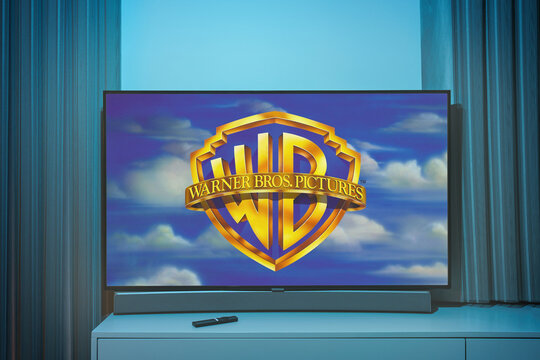 Warner Bros. intro logo on TV screen. Warner Bros pictures is an U.S. Film and Entertainment Studio