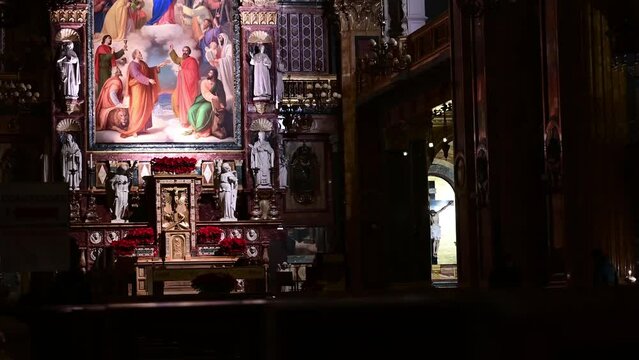 Turin, Piedmont, Italy. December 2022. Tilt footage inside the Basilica of Santa Maria Ausiliatrice. In evidence is the fresco representing Mary Help of Christians.