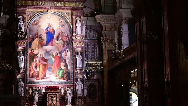 Turin, Piedmont, Italy. December 2022. Static footage inside the Basilica of Santa Maria Ausiliatrice. In evidence is the fresco representing Mary Help of Christians.