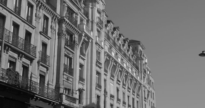 Grayscale View Of Haussmann Exterior Building During Daytime In Paris, France. close-up