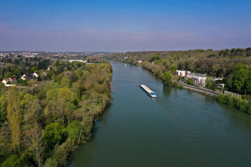 Fototapeta na wymiar aerial view of a barge on the Seine in Seine et Marne