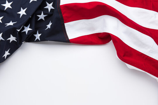 The flag of the United States of America on white background with copy space	