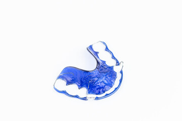 Plastic dental aligners for orthodontics on white background