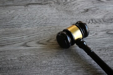 Judge's gavel on wooden table. Law and justice concept