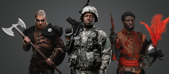 Shot of black soldier with camouflage uniform and viking with spanish conquistador.
