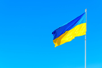 Ukrainian National Flag in Blue Sky