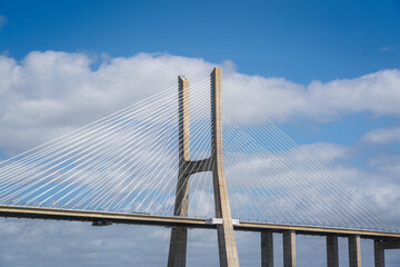 Close up view of a tower of Vasco da Gama bridge in Lisbon, Portugal