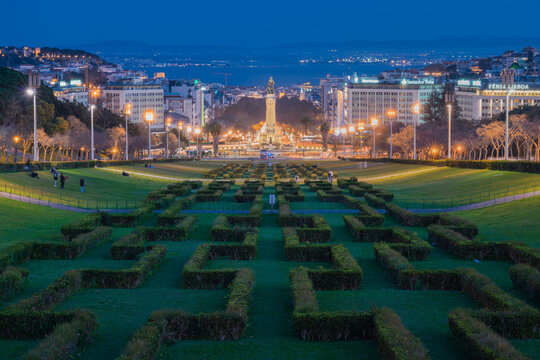 Eduardo VII Park in LIsbon at sunset with the city in the background