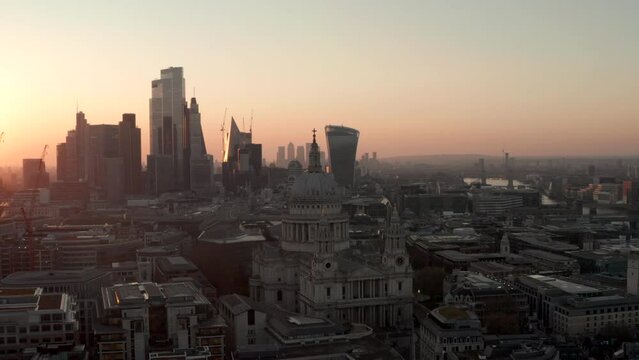 Circling aerial shot around St Pauls Cathedral in the bright morning light