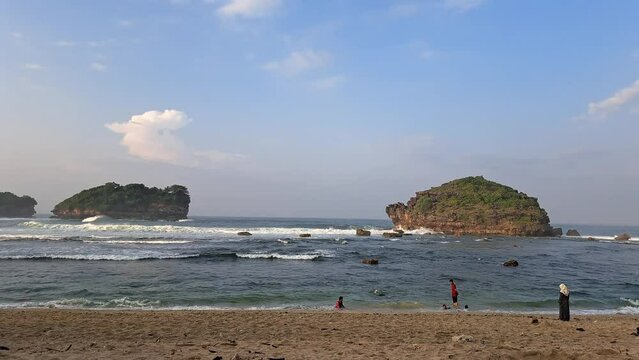 Watu Karung Beach is located in Pacitan, East Java, Indonesia. A beach with friendly waves for surfers.