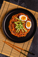Korean traditional food, cucumber and boiled egg cold spicy noodles.